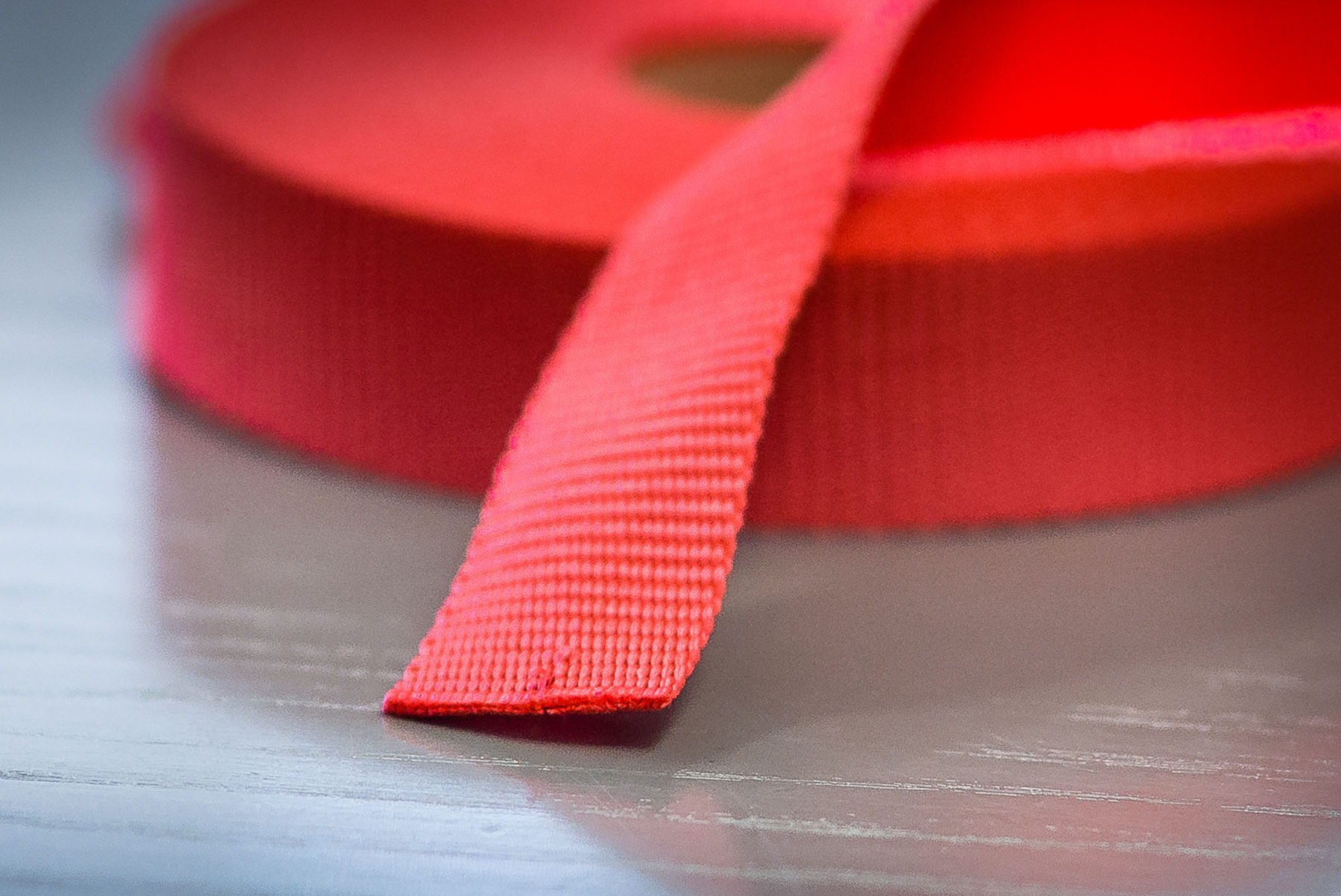 Bänder und Gurte mit Veredelung